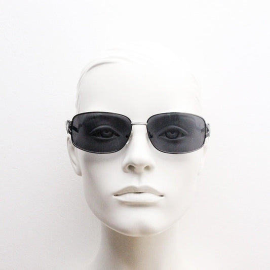2000s vintage rectangular bug eye sunglasses. Solid metal slightly oversized grey chrome frame with diamond lattice arm detail. Y2K NOS