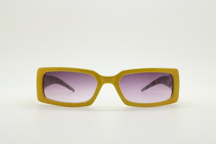 Y2K vintage rectangular shield sunglasses. Low profile canary yellow wrap around frame with quilt effect arms and ombre lenses. NOS. 2000s