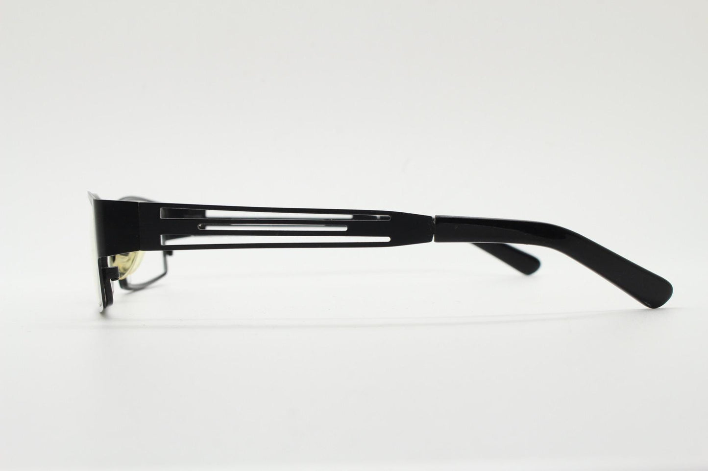 Police 90s vintage rectangular eye glasses model 023. Solid metal optical frame in black satin finish with cut out arm stripes. Prescription