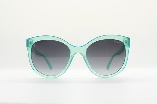 Pepe Jeans big cat eye sunglasses. Transparent chunky aquamarine frame with contrasting black graduating lenses. Womens vintage cateye