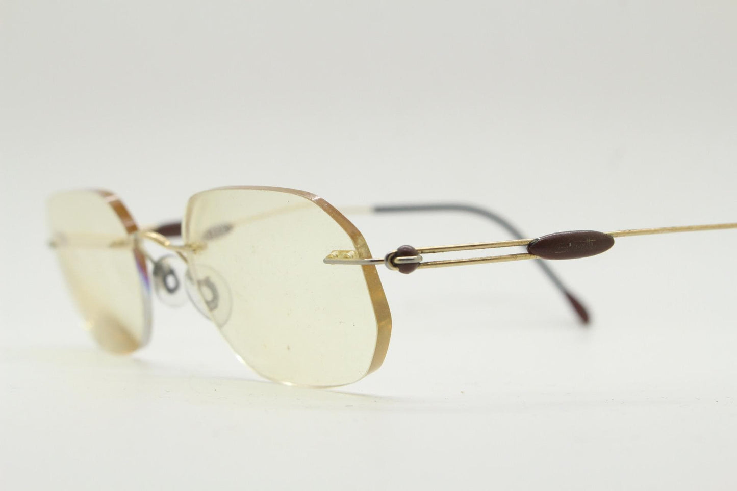 Silhouette vintage angular oval frameless eye glasses made in Austria. Minimal lightweight titanium optical frame. Prescription spectacles