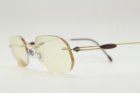 Silhouette vintage angular oval frameless eye glasses made in Austria. Minimal lightweight titanium optical frame. Prescription spectacles