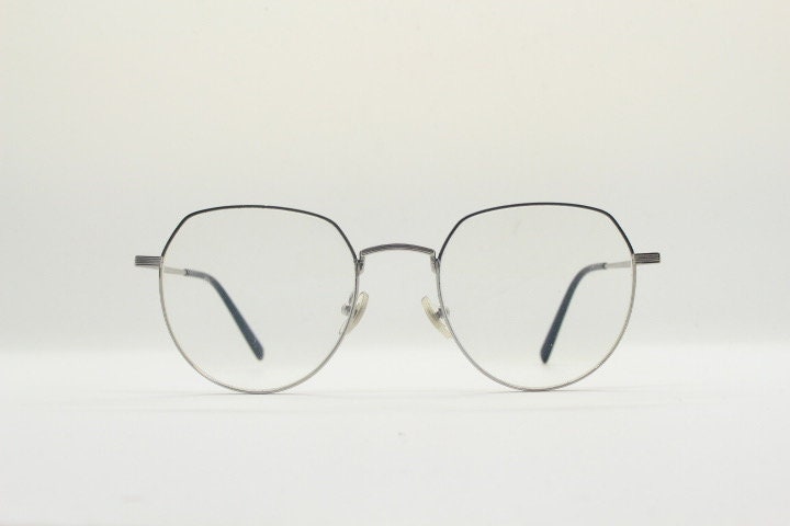 Bolon round panto flat top eye glasses model 7052. Slender silver metal optical frame with black brow. Prescription spectacles. Vintage RX