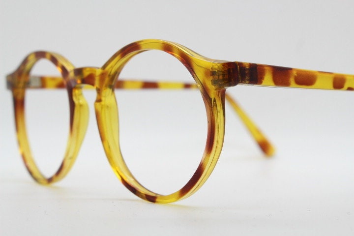90s vintage round glasses. 30s, 40s design optical frames in a vibrant honey tortoise finish. Prescription eyeglasses. Spectacles.O Malley