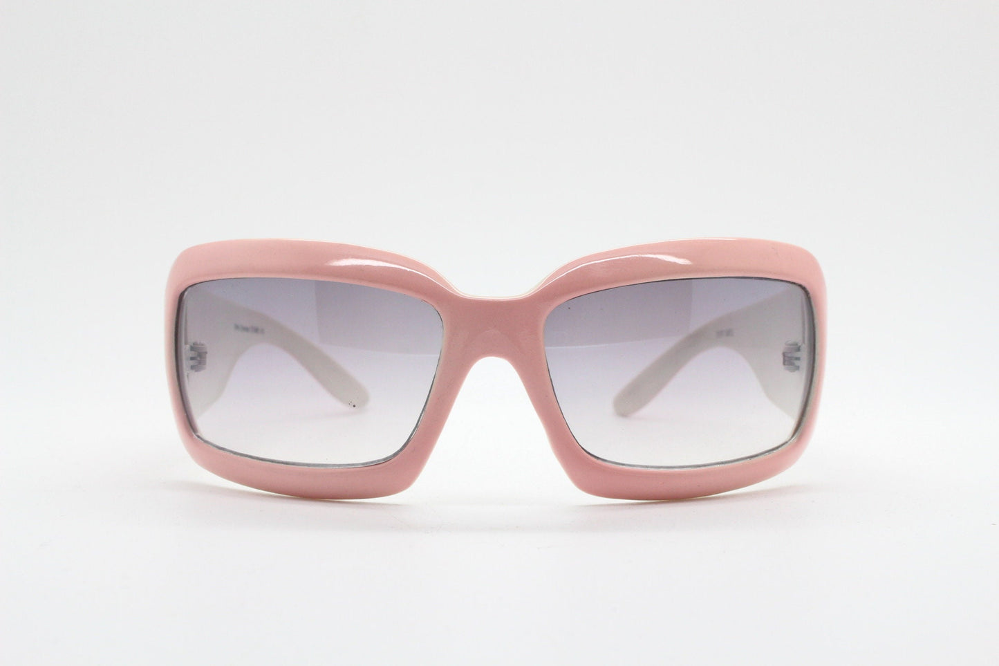 Y2k vintage rectangular wrap around bug eye sunglasses. Curving pink frame with big chain link logo. Rave shield fashion grail. 2000s NOS