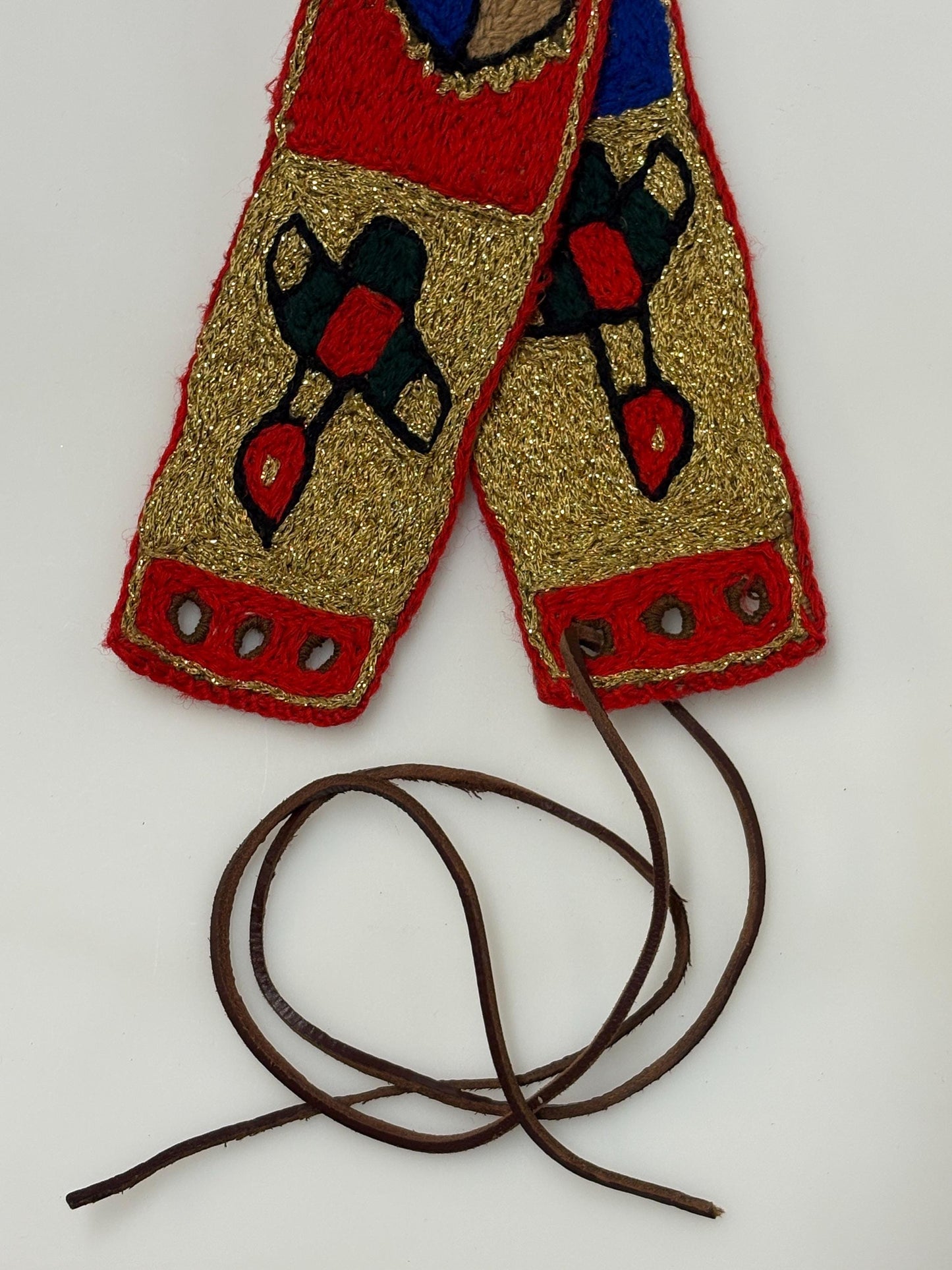 60s vintage completely hand made knitted belt. Embroidered sun, bird and abstract symbols with leather laced tie. Womens unique one off