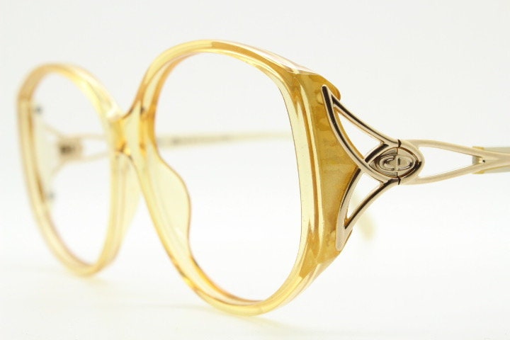 Christian Dior 70s vintage big round eye glasses made in Austria. Brown Optyl optical frames with distinctive logo. Prescription RX. NOS