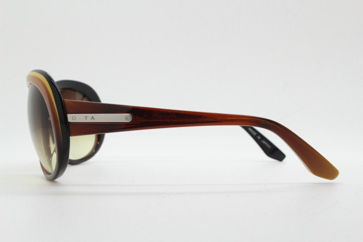 Dita oversized 70s design sunglasses model Pretender made in Japan. Gorgeous brown and black layered acetate. Womens NOS. 60s