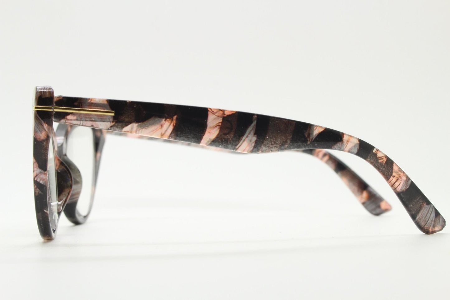 Dynamic pointed cat eye glasses. Transparent chunky cateye optical frame with pink and grey abstract pattern. Vintage Prescription RX
