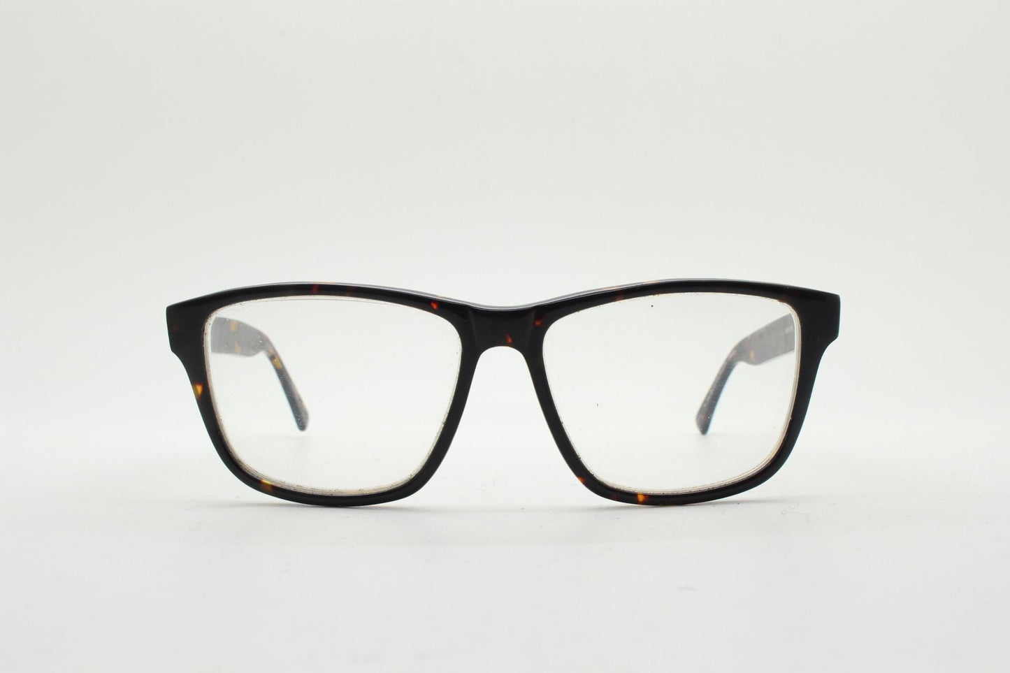 Cheap Monday rectangular low profile eye glasses. Dark brown tortoise gloss finish acetate optical frames. Prescription RX spectacles