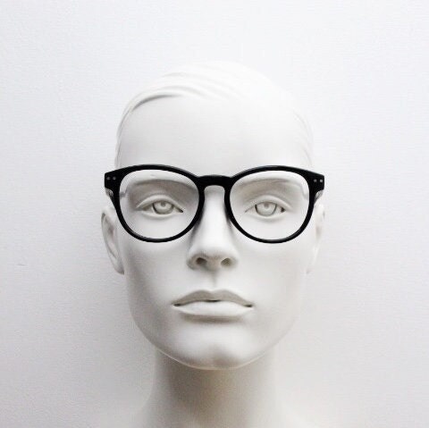 Just Cavalli vintage round eye glasses. Black gloss acetate optical frames with keyhole bridge. Prescription RX spectacles
