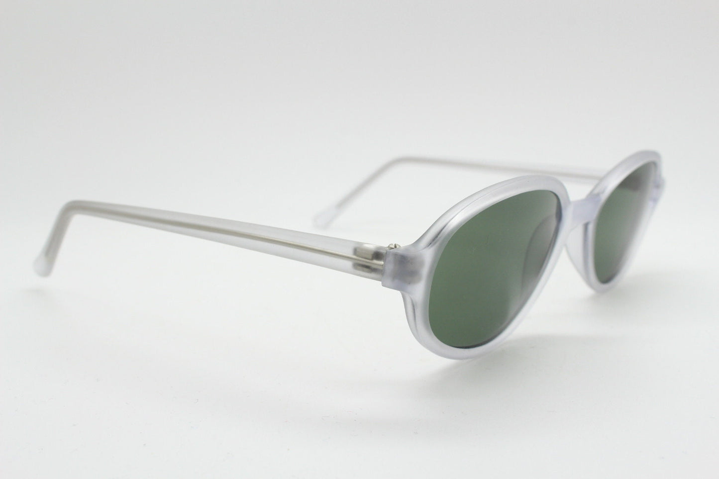 Vintage 90s futuristic oval sunglasses. Frosted transparent frame cat eye with dark green lenses. Unused NOS