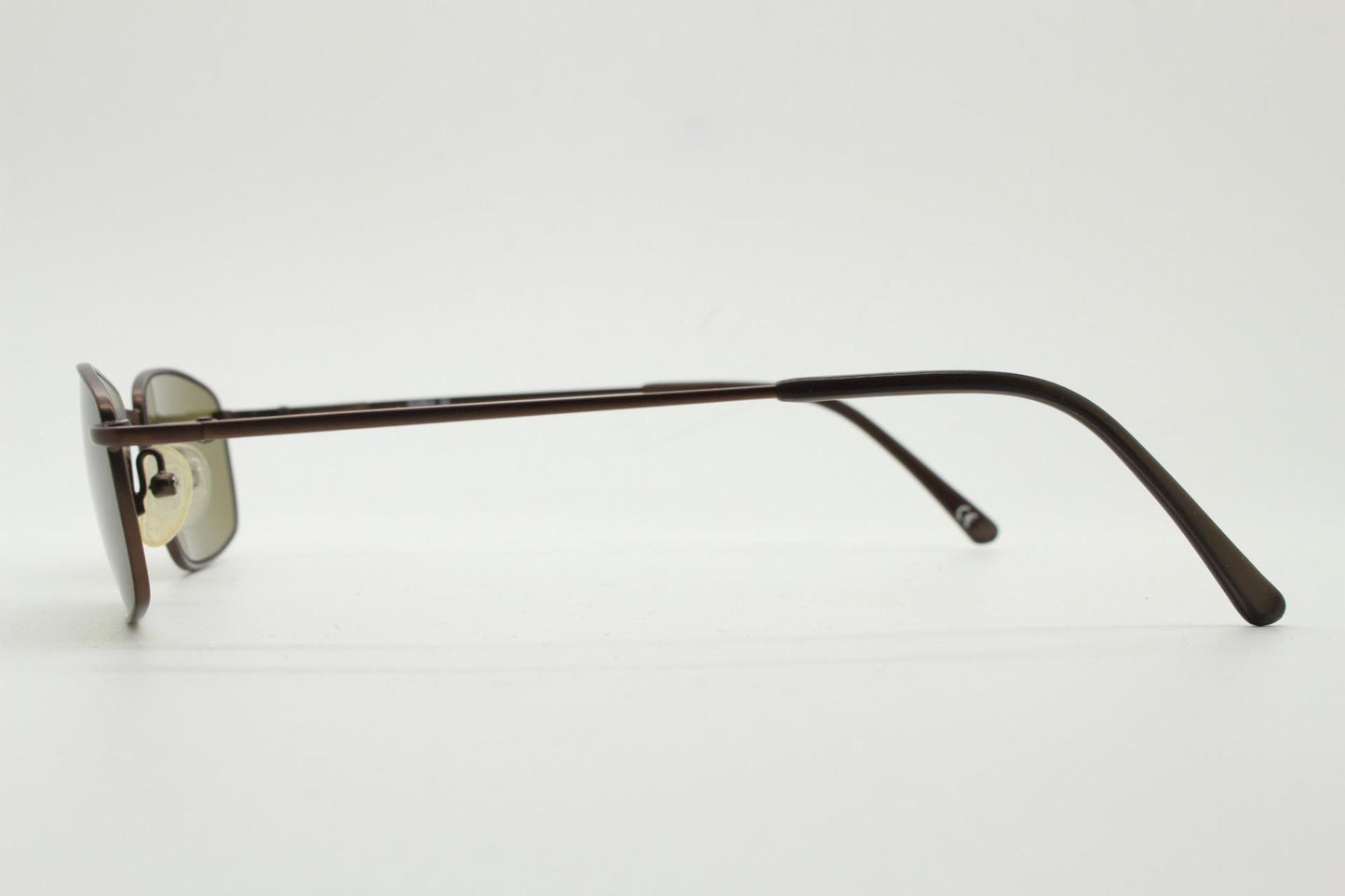 90s vintage rectangular low profile metal sunglasses. Minimal slim metal frame in satin bronze finish with plain brown lenses. NOS. BNWT