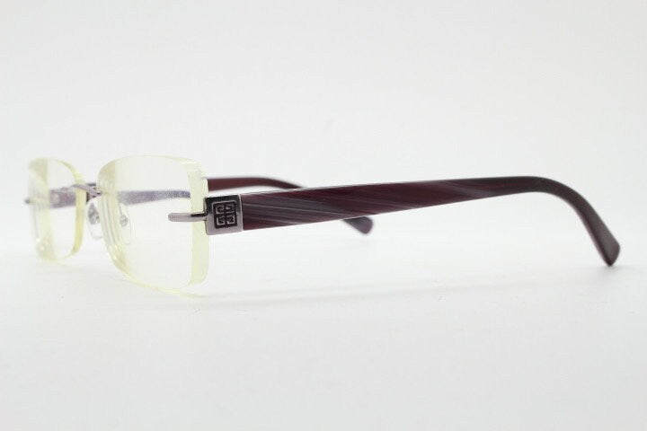 Givenchy rectangular frameless eye glasses made in Italy. Minimal optical frame with marbled brown arms. Prescription RX spectacles. Vintage