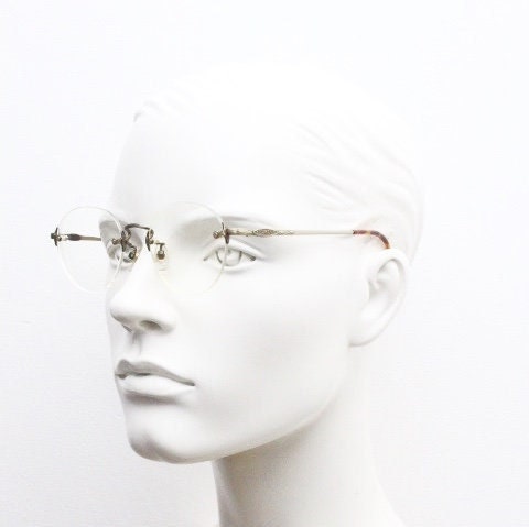 Edwin vintage 90s frameless round eye glasses model 59392A made in Japan. Minimal satin bronze finish optical frame. Prescription RX