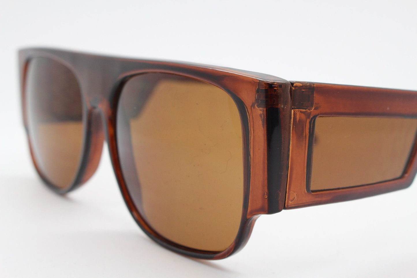 Y2K vintage rectangular side panel sunglasses. Brown transparent frame with matching lens tone blinkers. 2000s NOS unused goggle