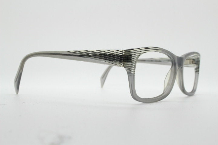 Alain Mikli rectangular eye glasses made in France. Dynamic black and white striped layered acetate grey optical frame. Prescription RX