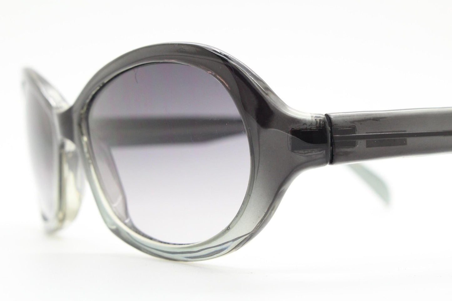 Y2K vintage oval bug eye sunglasses. Tasteful transparent grey acetate frame with matching graduated lenses. 2000s NOS. BNWT