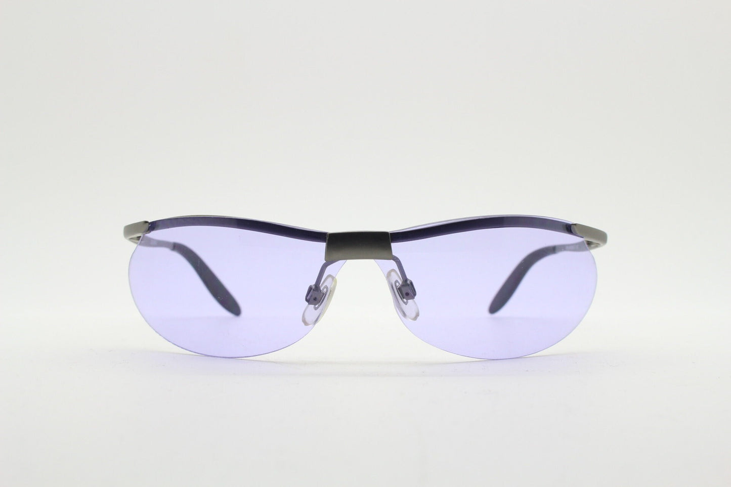 Y2K vintage sport shield sunglasses. 2000's half frame wraparound aerodynamic mini mask visor with purple bug eye lenses. 90s 00s unused NOS