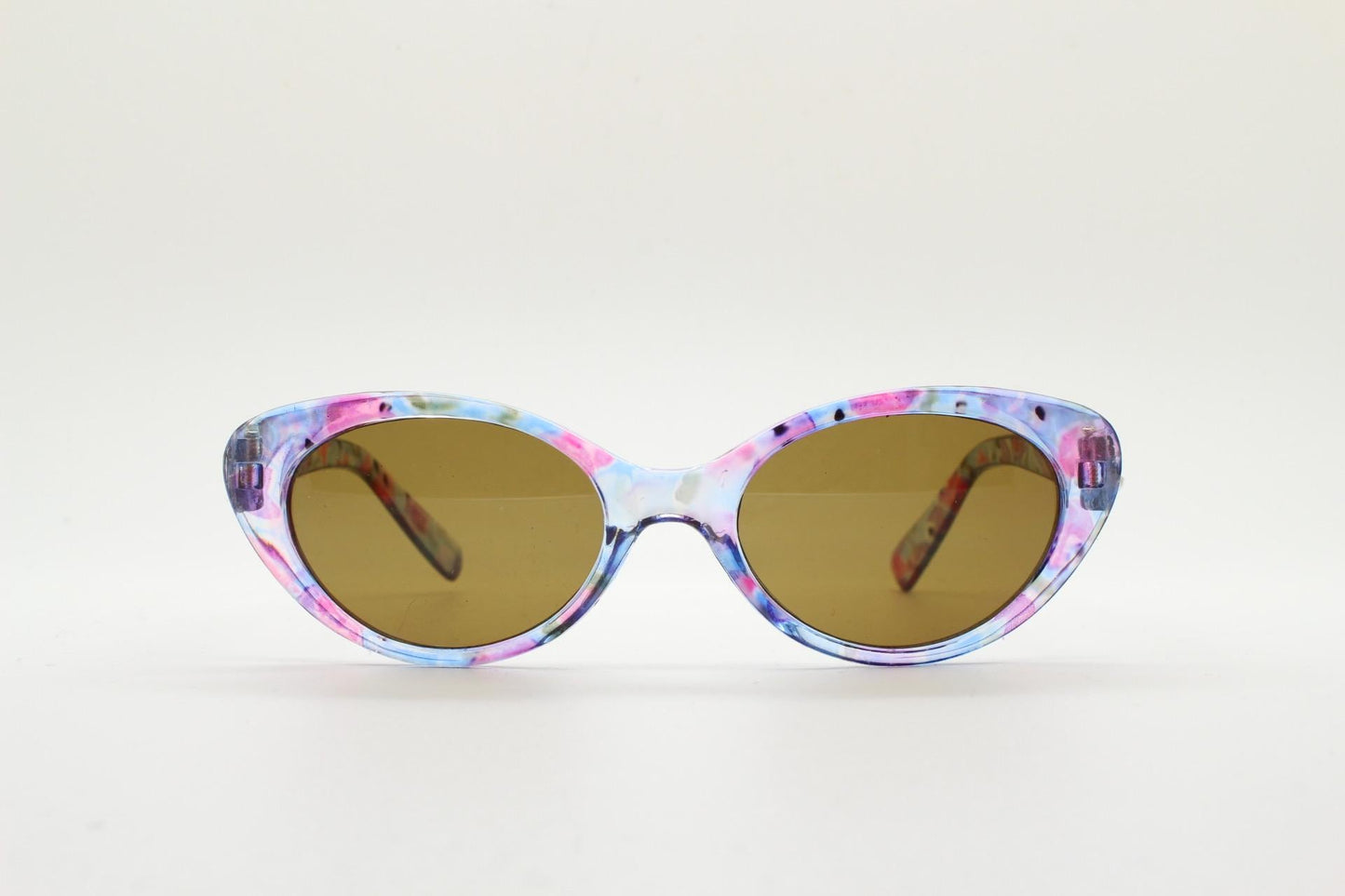 90s vintage oval cat eye sunglasses. Vibrant transparent multi coloured frame with mid tone brown lenses. 80s. NOS. BNWT