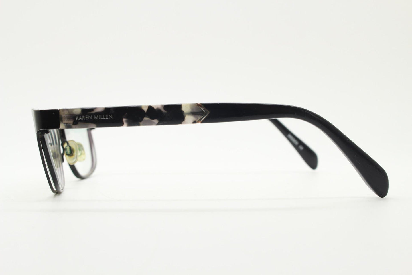 Karen Millen vintage rectangular cat eye glasses. Black satin finish metal front with grey marbled arms. Optical frames. Womens prescription