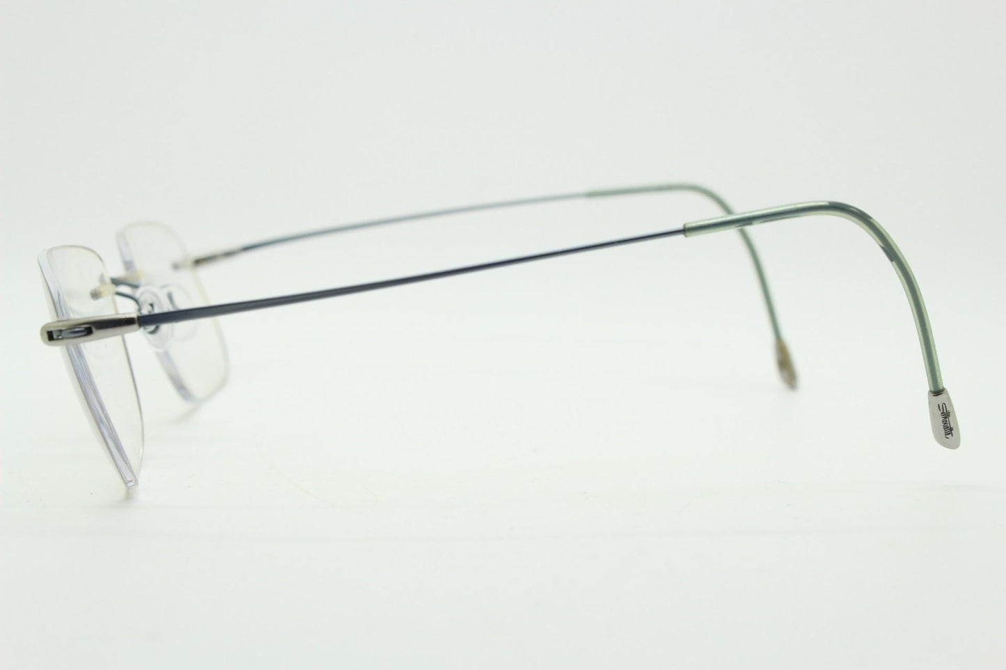 Silhouette rectangular frameless eye glasses model 7554 made in Austria. Minimal lightweight titanium optical frame. Prescription RX