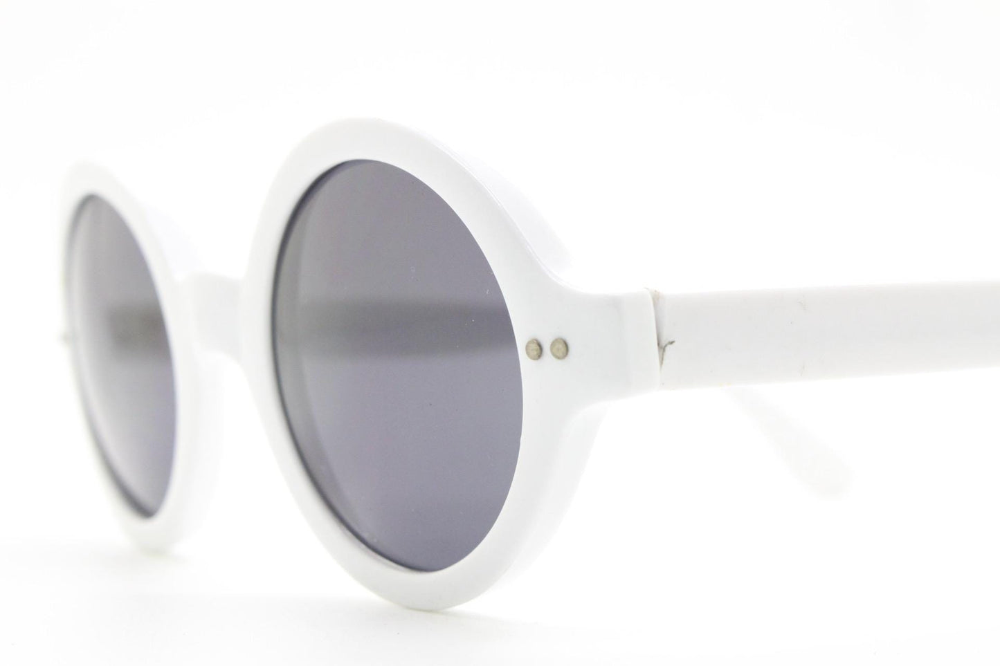 90s vintage round monochrome sunglasses. 30s design in an ice white frame with plain black lenses. Quality construction unused NOS