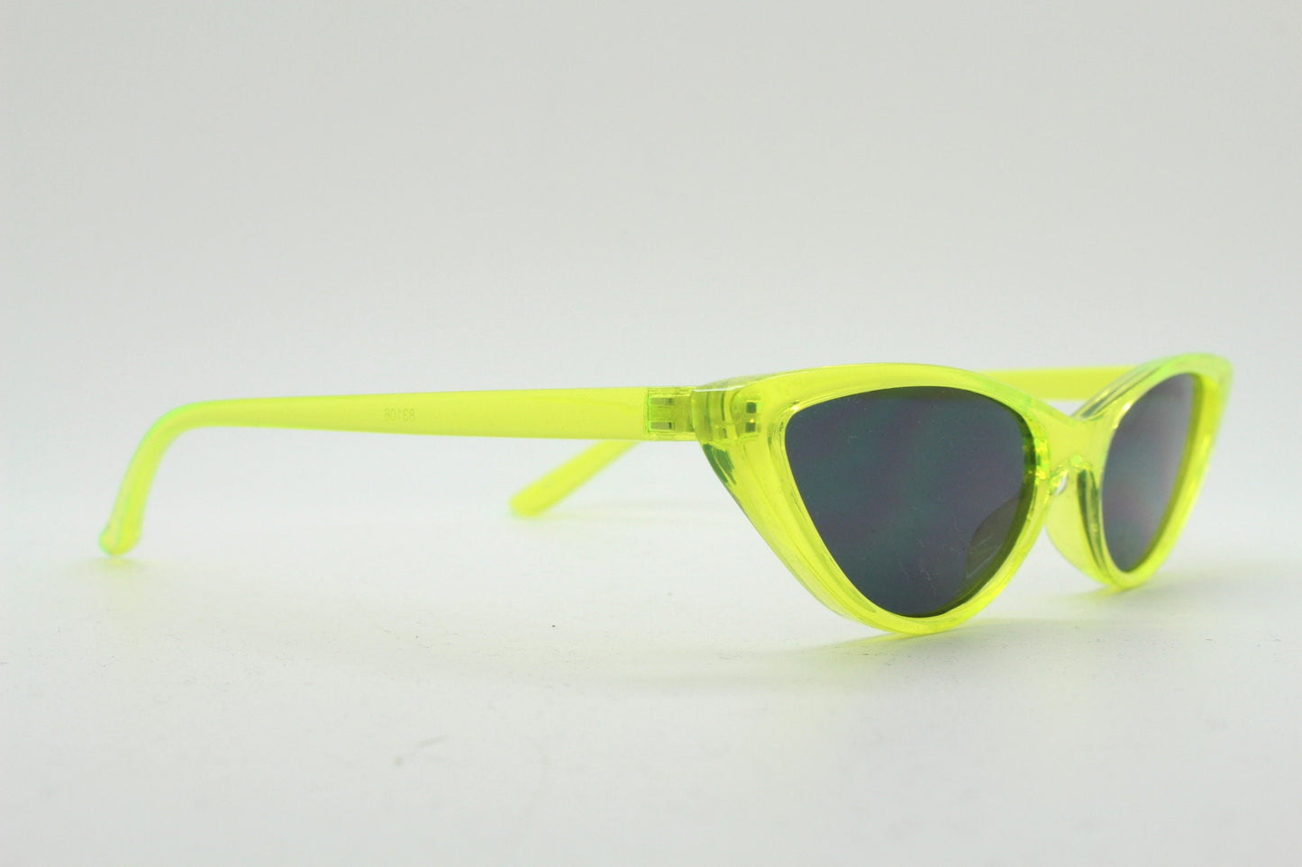 Y2K vintage extreme pointed cat eye sunglasses. Stylised yellow transparent frame with black lenses. Womens 50s style psychabilly. NOS