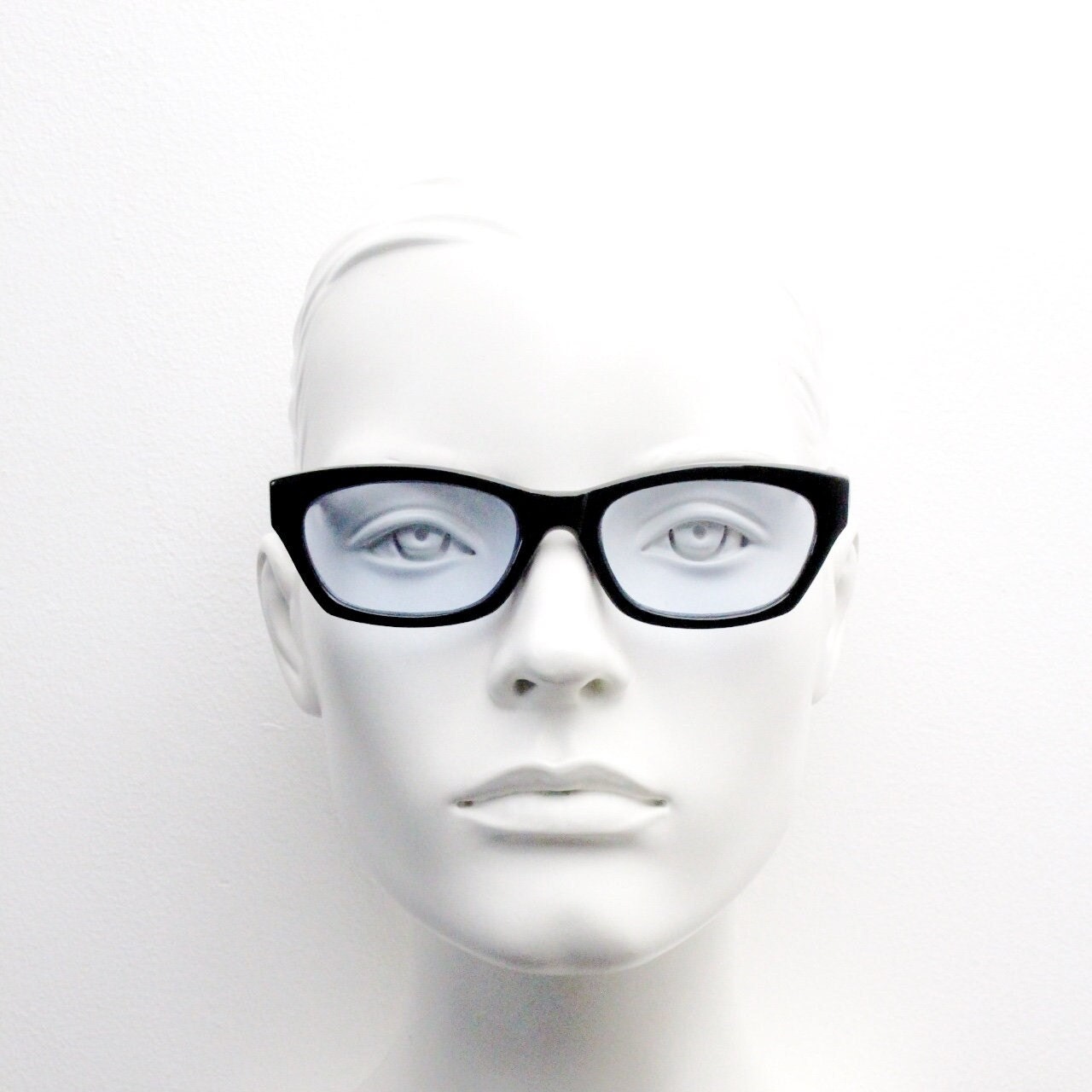 80s vintage rectangular sunglasses. Low profile 60s design black gloss frame with extra light tone sky blue lenses. BNWT Unused NOS
