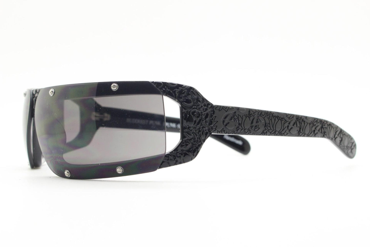 Buddhist Punk wrap around sunglasses hand made by Linda Farrow. Black acetate frame with abstract cut out patterns. Projects. Vintage. NOS