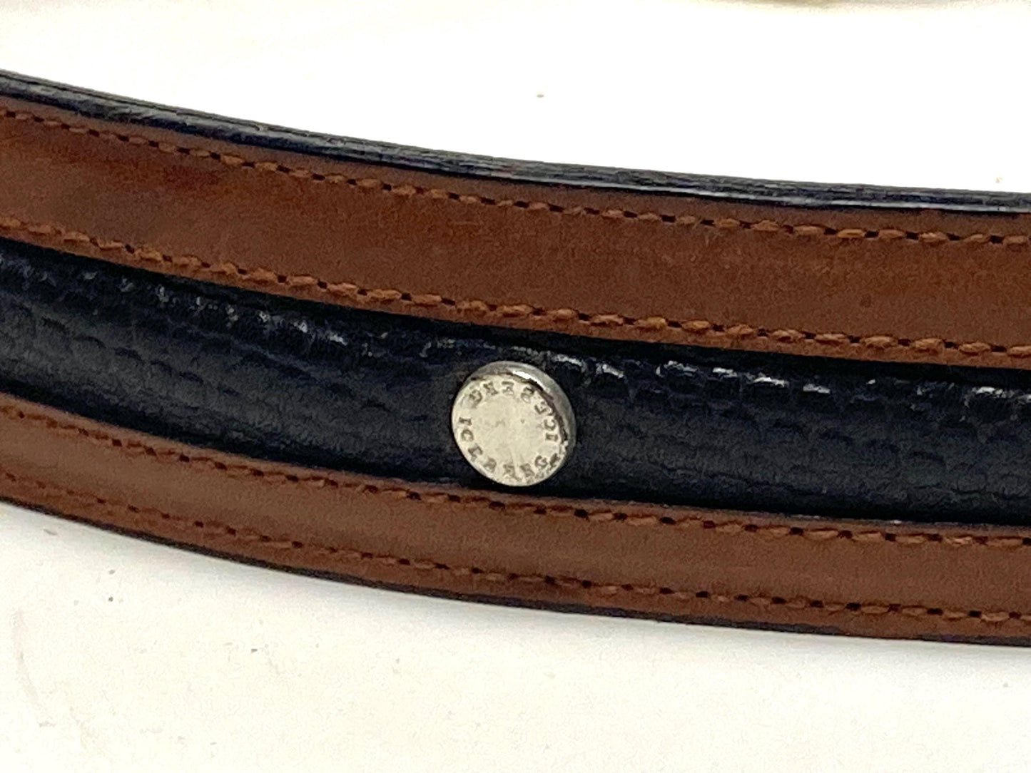 Iceberg 90s vintage black and brown genuine leather belt with big silver buckle depicting bucking bronco's. Made in Italy. BNWT. NOS