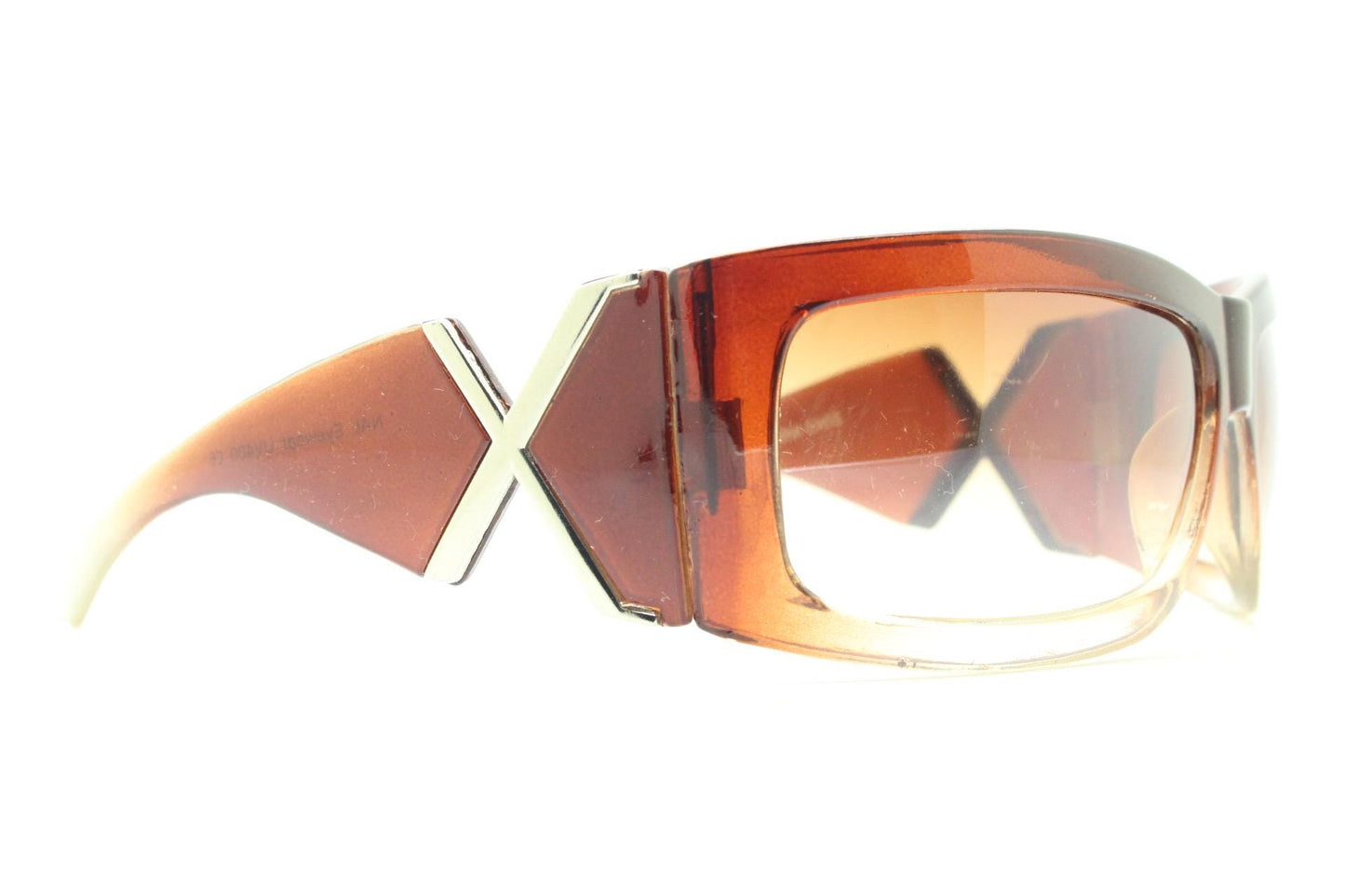 Y2K vintage big wrap around sunglasses. Transparent brown shield design with hot graduating lenses and big X crest. 2000s bug eye. NOS