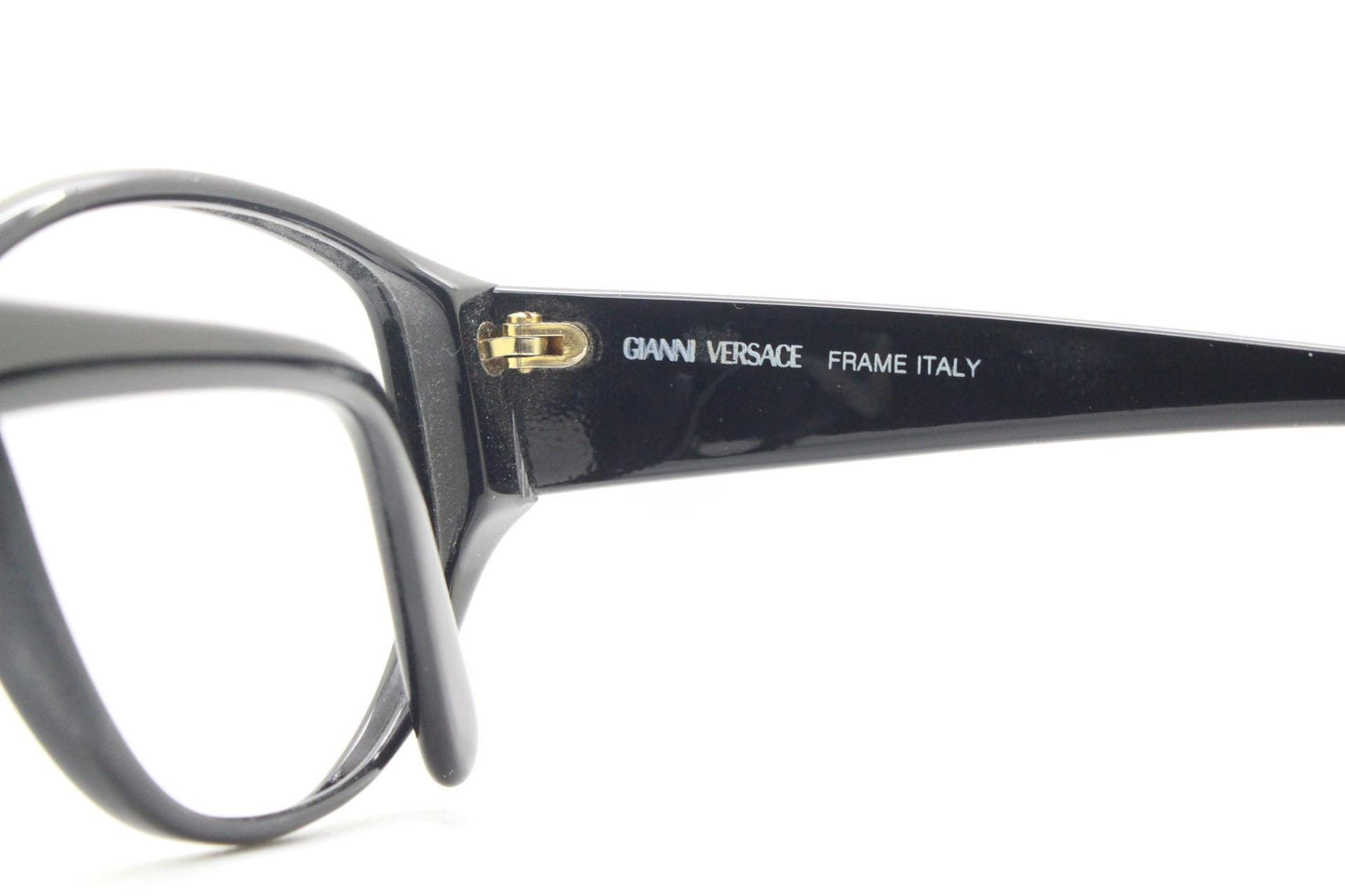 Versace modified cropped cat eye glasses made in Italy. Black gloss acetate optical frames with dramatic diamante. Prescription. Vintage NOS