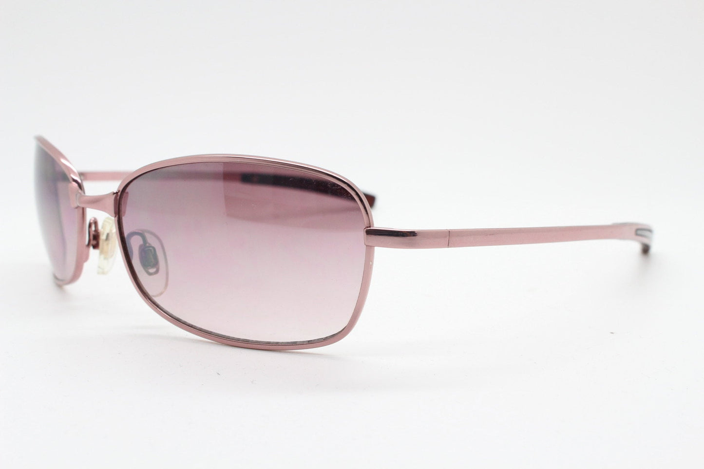 Y2K vintage curved sunglasses. Unusual Pink chrome metal frame with matching flared rectangular lenses. Unused 2000s NOS