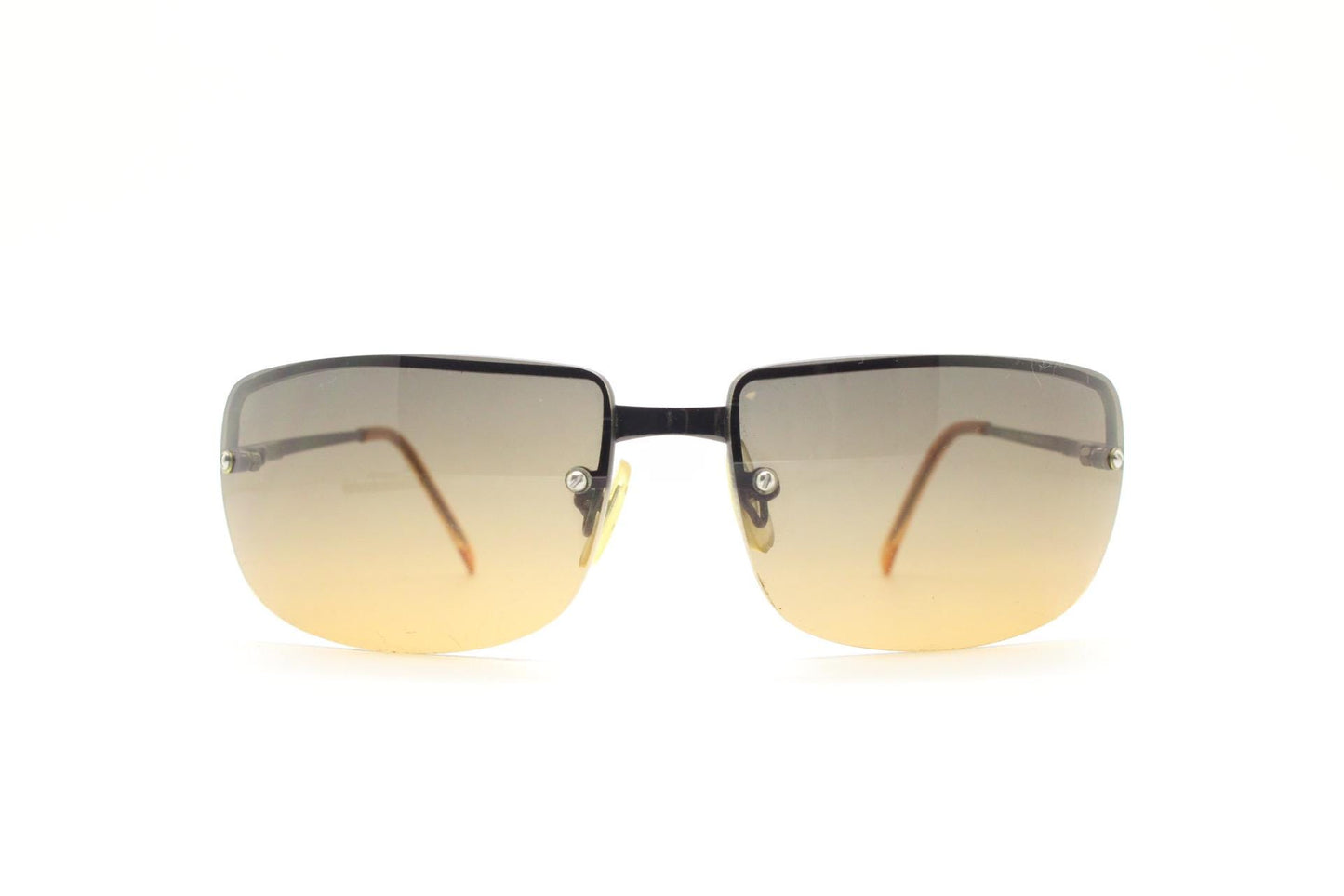Y2K vintage curved rectangular sunglasses. Minimal half frame in brown chrome with grey to amber fade lenses. 2000's. 00's NOS