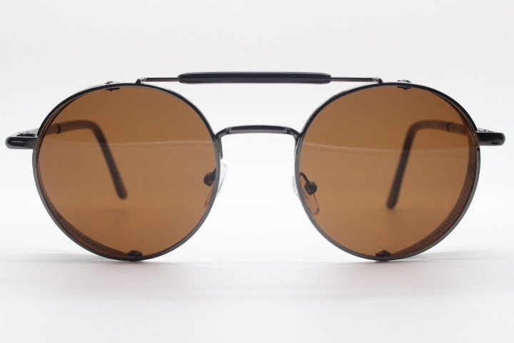 90s vintage round goggle sunglasses. All metal grey chrome frame with folding blinkers and brown lenses. Spoilers. Steampunk. NOS