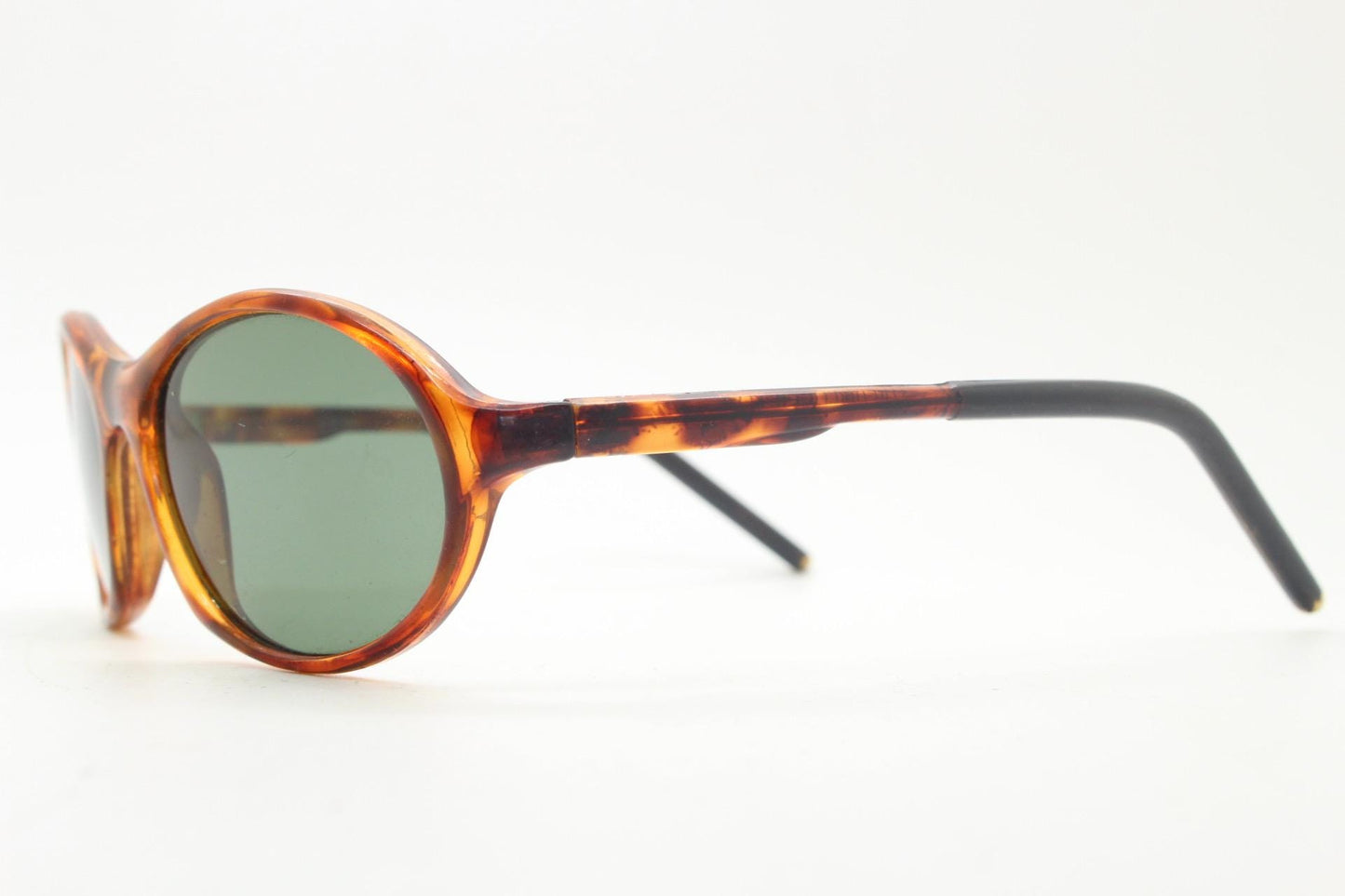 90s vintage oval small bug eye sunglasses. Tortoise gloss frame with quality real green glass lenses