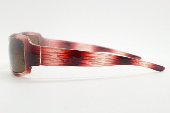 Vintage rectangular shield sunglasses. Transparent abstract red tiger print low profile visor style wrap around frame. Y2K NOS. 2000s