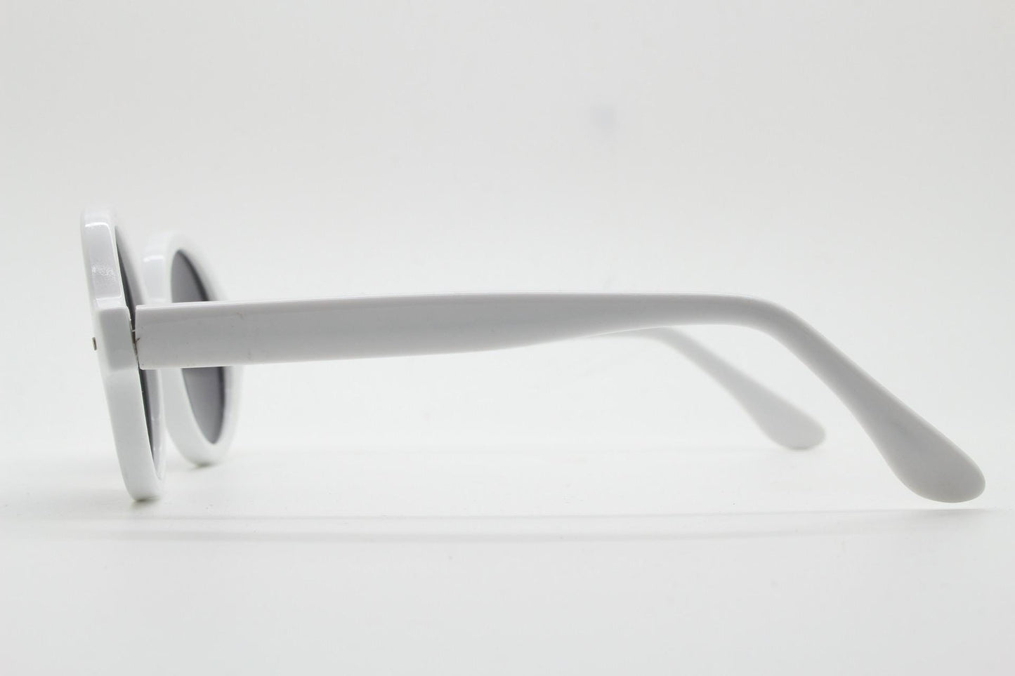 90s vintage round monochrome sunglasses. 30s design in an ice white frame with plain black lenses. Quality construction unused NOS