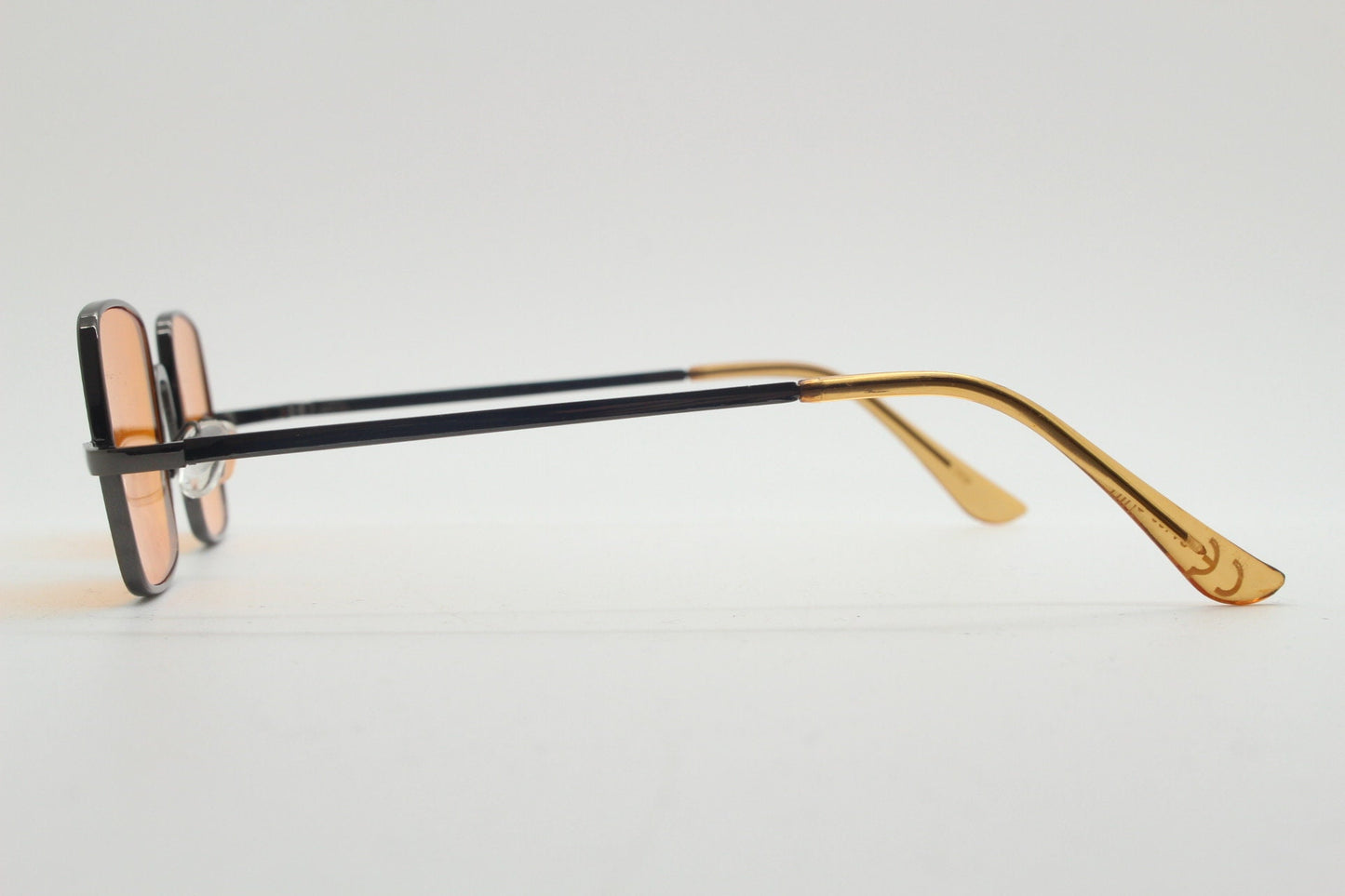 90s vintage small square sunglasses. Imposing minimal bronze brown metal Victorian style frame with blazing orange lenses. Steampunk. NOS