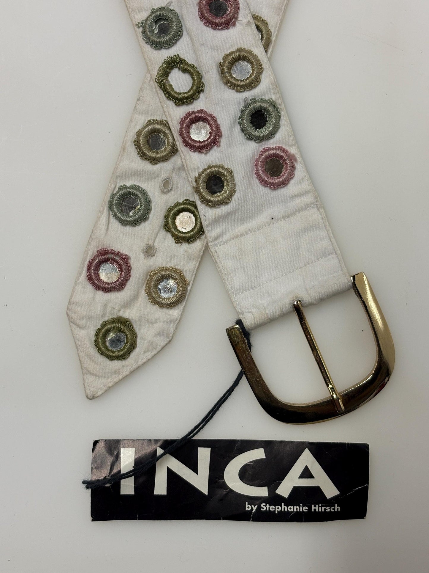 Y2K vintage womens dress belt by Stephanie Hirsch. White with pink and green embroidered little frames around mirror circles. 2000s. BNWT