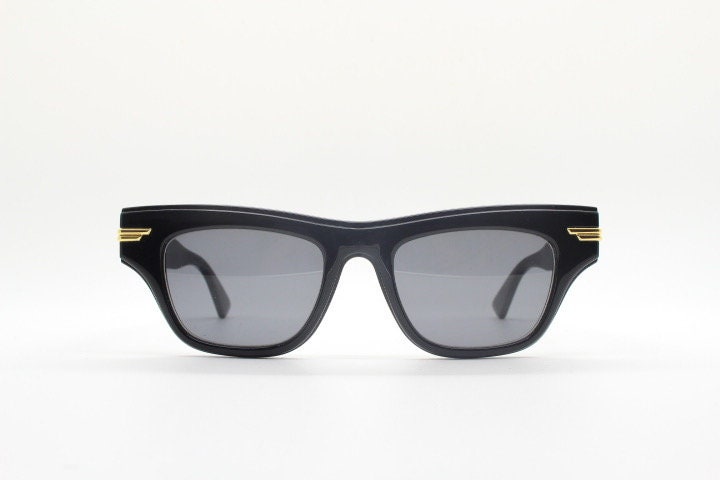 Bottega Veneta thick flat top cat eye sunglasses made in Japan. Black gloss acetate frame with sharp cropped sides. Womens cateye. BNWOT