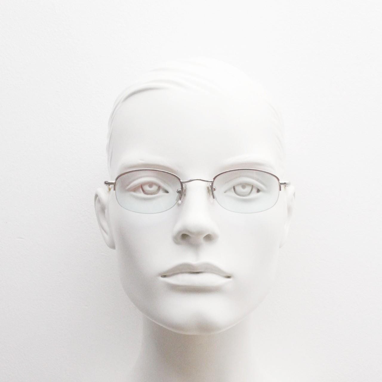 90s vintage small rectangular sunglasses. Silver chrome half frame with light tone lenses with gold mirror glaze. 2000's. Y2K. NOS micro