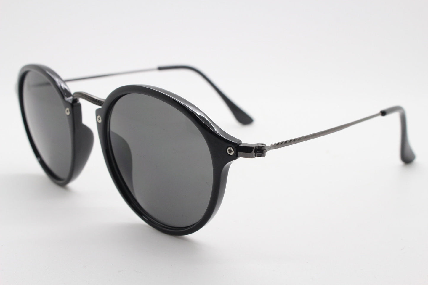 90s vintage round sunglasses. Black gloss slim 30s 40s design frame with metal bridge and dark lenses. Unused NOS