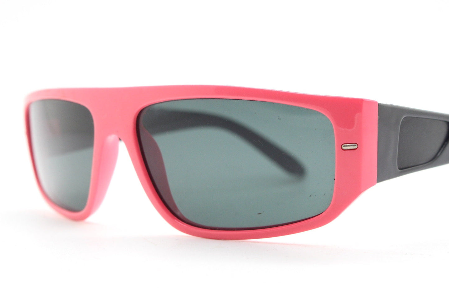 80s vintage 2 tone sunglasses. Aerodynamic flat top shield style wrap around frame in pink and black with real glass lenses. Unused NOS