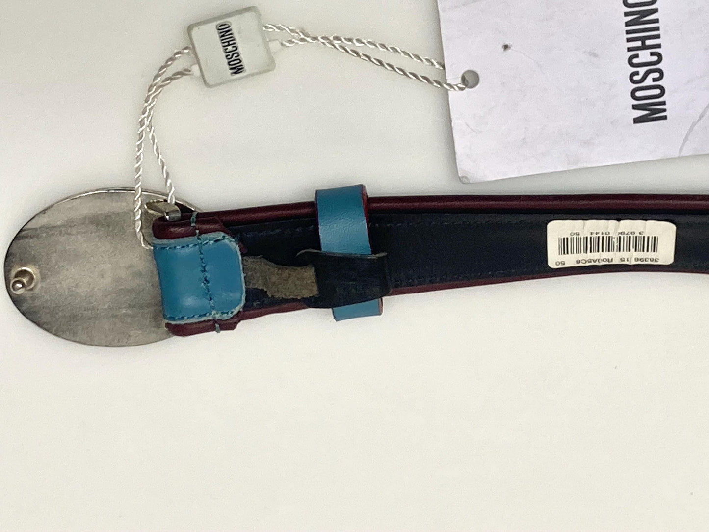 Moschino 90s vintage womens dress belt in oxblood and blue genuine leather with oval enamelled metal buckle. Made in Italy. BNWT. NOS