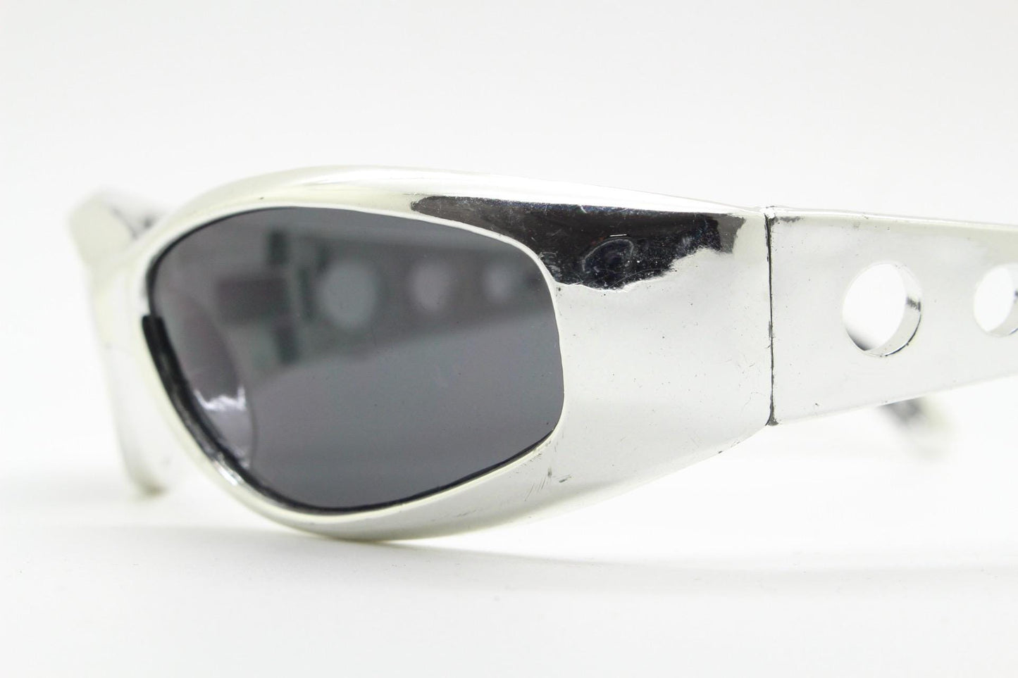 90s vintage visor sunglasses. Hyper real metallic silver superhero style mini mask sport shield with black lenses. Wrap around. NOS cosplay