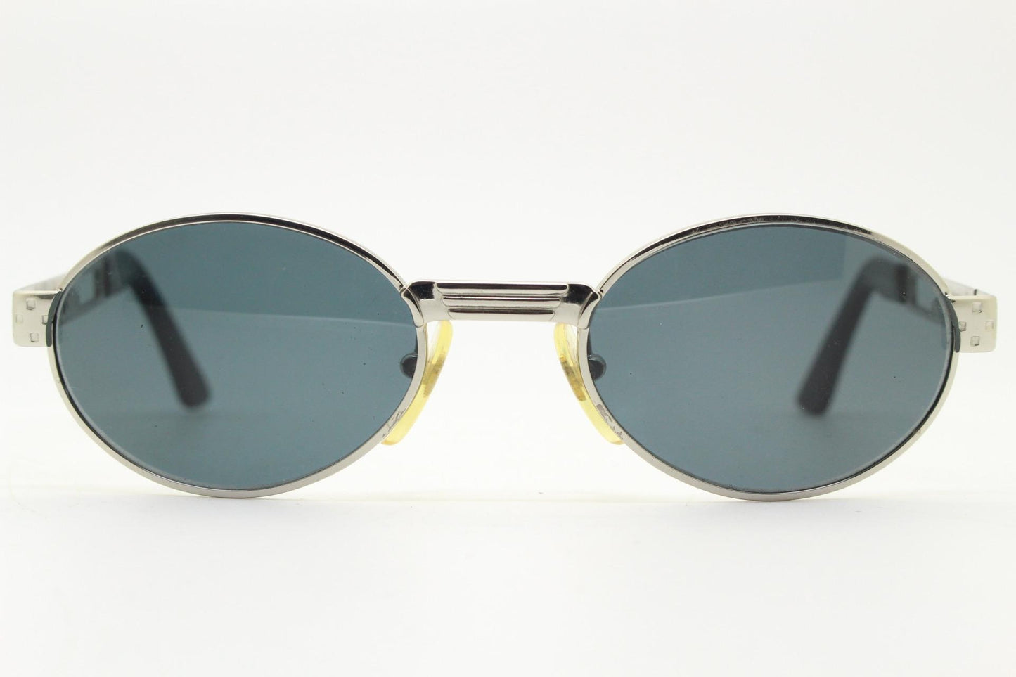 Prestige 90s vintage oval small bug eye sunglasses model 4028 made in Italy. Chrome finish solid metal frame with indented arm pattern. NOS