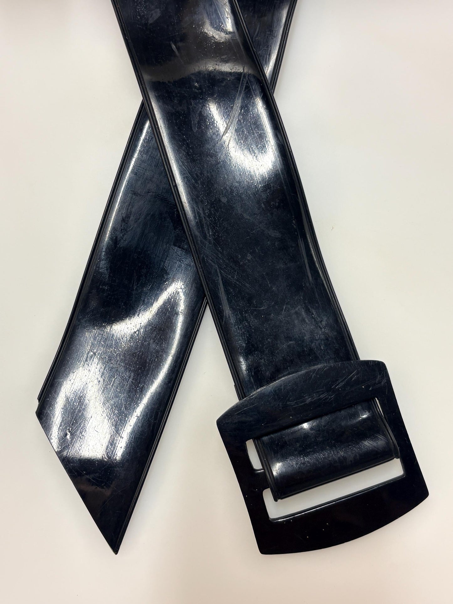 80s vintage womens shiny fetish 2" dress belt. All black seamless vinyl with well matched flat buckle. 50s kinky pin up bad girl