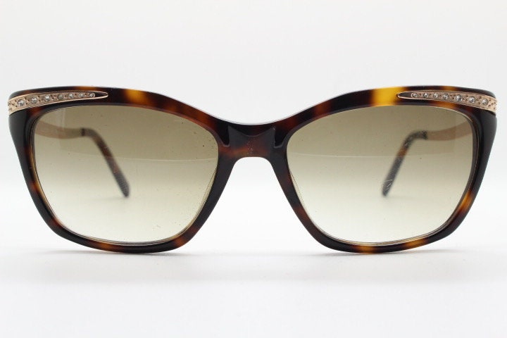 Borsalino cat eye sunglasses made in Italy model 250. Womens Tortoise acetate frame with dramatic diamante golden arms. Rhinestone cateye